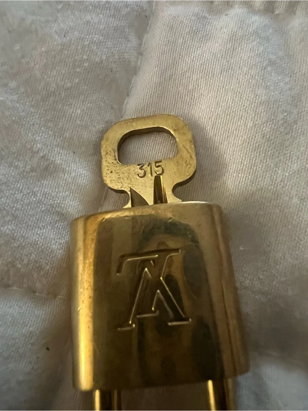 Louis Vuitton Gold Padlock and key with LV Logo